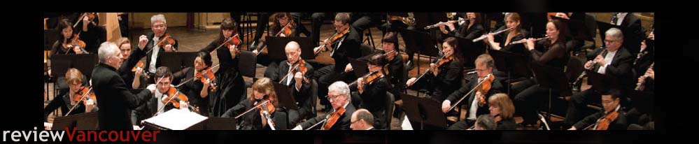 Maestro Bramwell Tovey conducting the Vancouver Symphony Orchestra